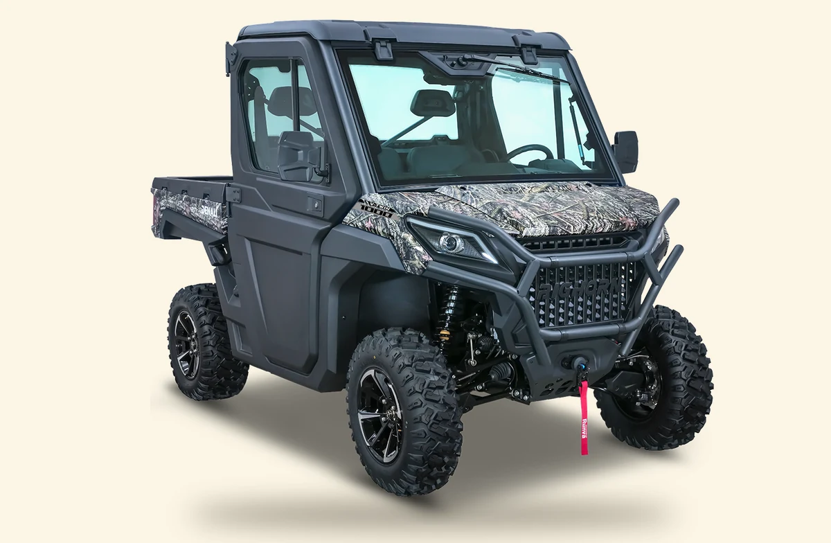 Bighorn Denali 1000 UTV in camo with full cab, front three quarter view